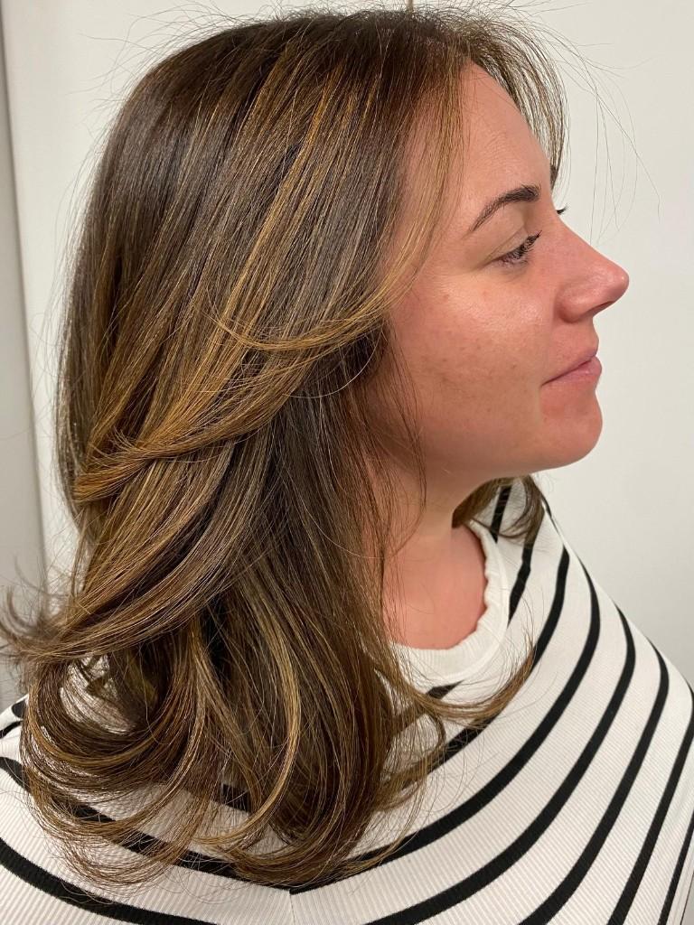 Layered brunette with golden blonde highlights